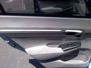 Porsche 911 with a new German canvas convertible top.