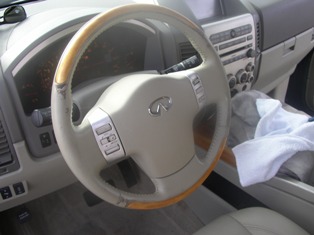 Lexus door panel repaired and dyed.